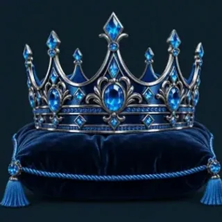 Gold crown on cushion — A Big Candy